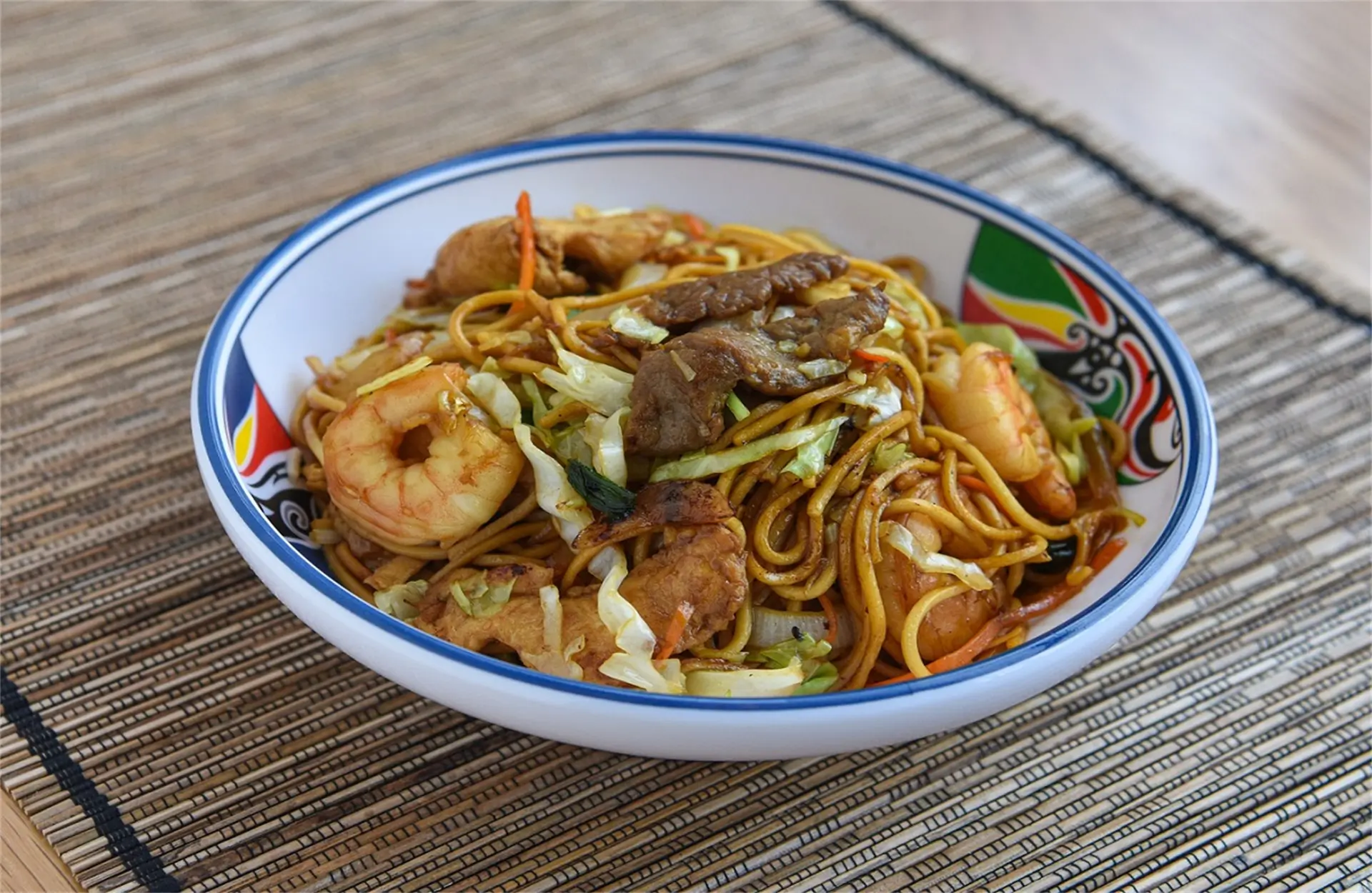Noodles with shrimp, beef, veggies, a Chinese Restaurant in USA
