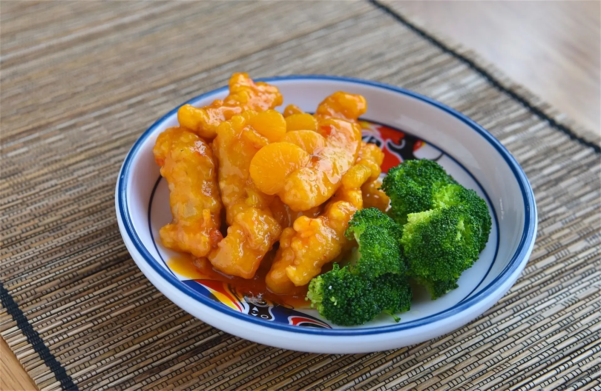 Tender chicken in orange sauce with broccoli, a Chinese Restaurant in USA